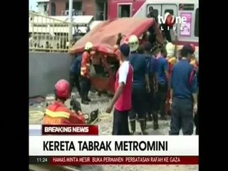 At least 18 dead in Jakarta bus, train crash