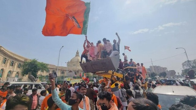 Watch: BJP workers celebrate party's lead in UP elections on bulldozers in Lucknow