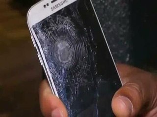 Paris attack survivor: phone 'saved me'