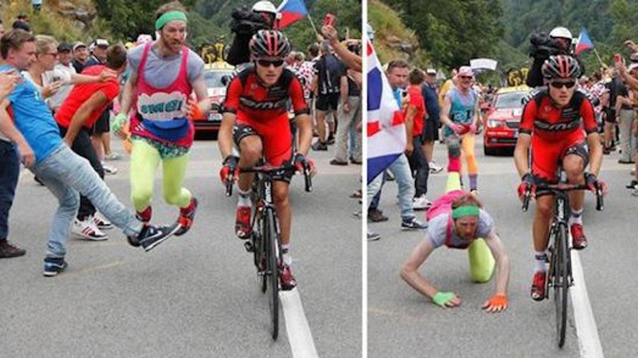 Tour de France 2013 : Un spectateur fait un croche-patte à un fan qui courait derrière un coureur