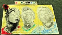 Avec un ballon de foot, l'artiste Red Hong Yi peint les visages de Cristiano Ronaldo, Lionel Messi et Neymar