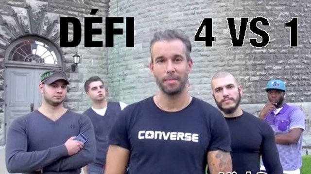 Un homme défie quatre mecs qui doivent essayer de le mettre au sol