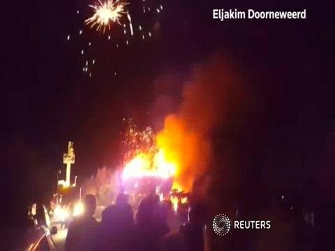 House fire ignites fireworks, injures three: video