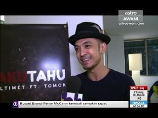 Kenali seorang ayah yang berbeza bernama Tomok