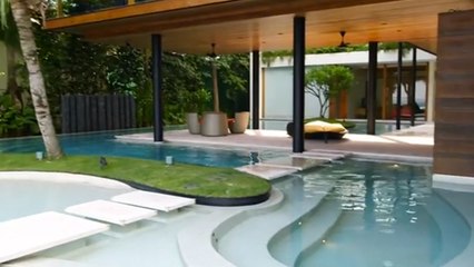 Stephen Fisher habite dans une maison où la piscine fait partie intégrante des murs