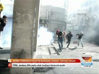 Beribu Palestin bergasak dengan tentera Yahudi