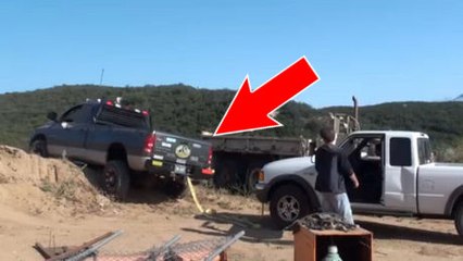 Il tente de remorquer un pick-up et arrache son pare-choc