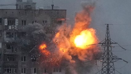 Russian forces target residential areas of Ukrainian cities and tighten grip on capital Kyiv