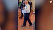 Grandparents walk down aisle as flower girl and ring bearer reducing bride to tears