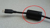 A quoi sert ce petit cylindre sur le chargeur de votre ordinateur portable ?