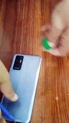 how to make mobile phone stand.using plastic bottle cap.