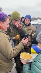 Ukrainian channels of a captured Russian soldier apparently being fed by locals.