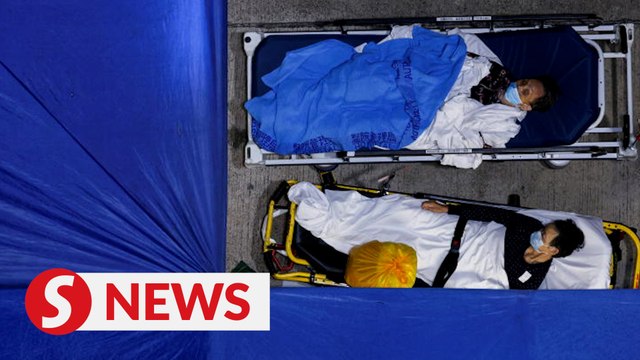 Covid surges in Hong Kong, leader urges vaccines