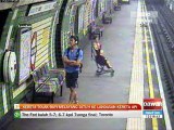 Kereta tolak bayi melayang jatuh ke landasan kereta api