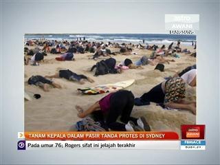 Tanam kepala dalam pasir tanda protes di Sydney
