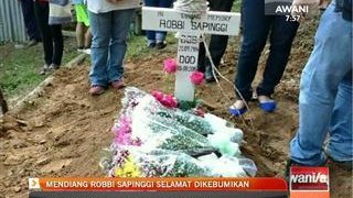 Mendiang Robbi Sapinggi selamat disemadikan