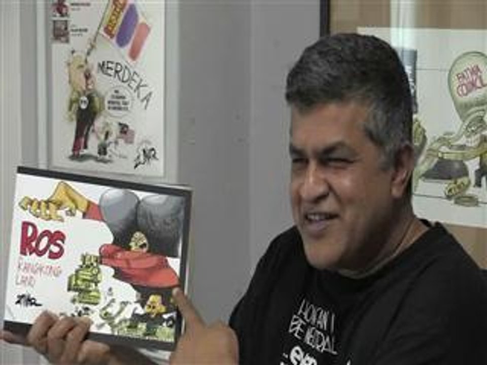 Malaysian cartoonist defiant 'to the last drop of my ink' - Video ...