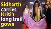 Sidharth Malhota helps Kriti Sanon with her long trail gown,  fans says 'Kiara ne jal jana hai by god'