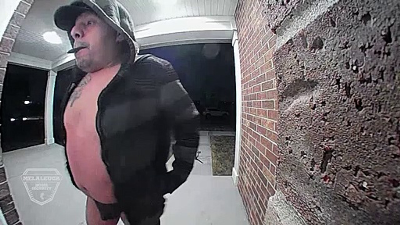 Half-Naked Man Poses on Porch