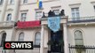 Oligarch's £5 million central London mansion occupied by squatters who fly Ukrainian flag from the window