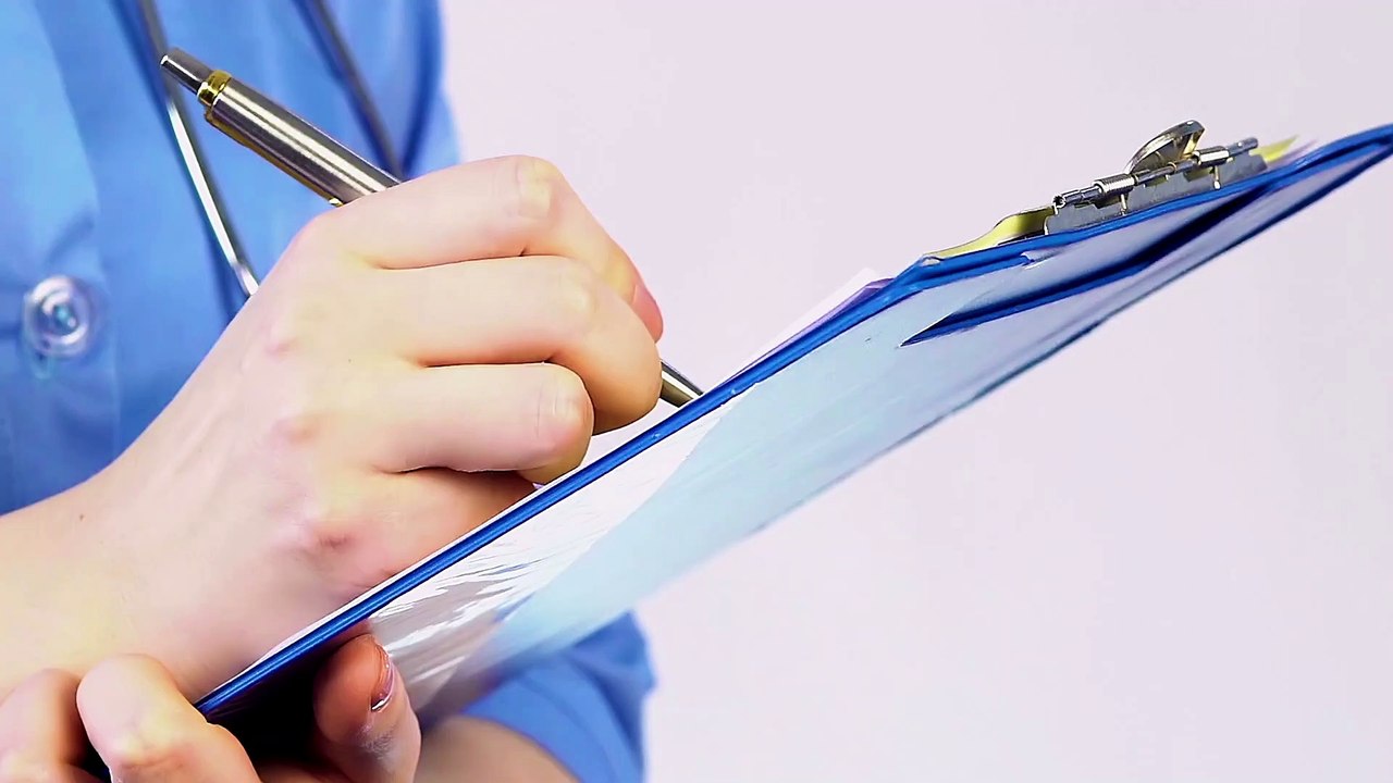 national nurse day a nurse write medicine for patient