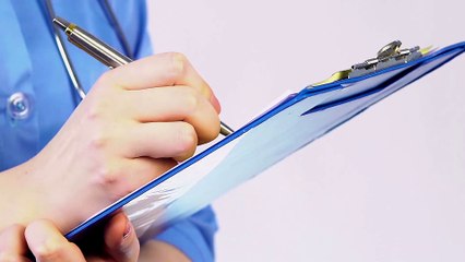 national nurse day a nurse write medicine for patient