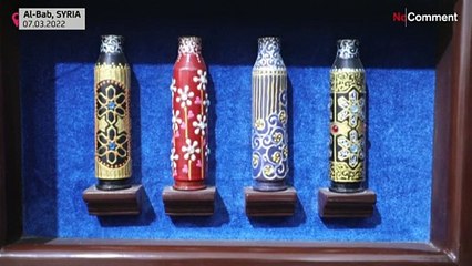 Silahları renkli sanat eserlerine çeviren Suriyeli sanatçı