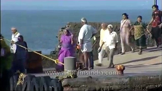 Visitors going back to their boat after visiting Kanyakumari Temple