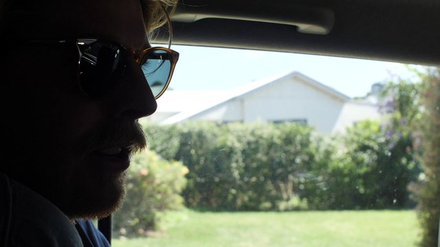 South Coast Register - Steve Preston surfing.