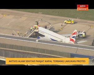 Aktivis alam sekitar panjat kapal terbang lakukan protes