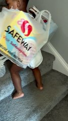 Pandemic Baby Carrying Groceries