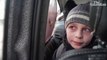 'We left our Dad in Kyiv' - young Ukrainian boy in tears after fleeing capital