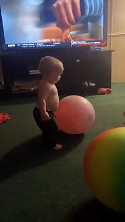 Kid Lands Headfirst on Toy Ball