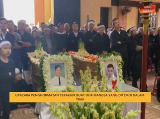 Upacara penghormatan terakhir buat dua mangsa yang ditemui dalam trak