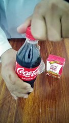 Experiment.amazing reaction Coca-Cola and milk.