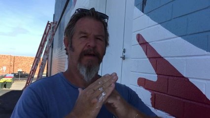 Simon Thomas of Chalk Talk talks about the mural at Club Sapphire