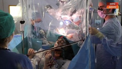 Wanita sempat gesek biola ketika pembedahan otak!