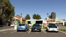 Energy companies trialling ways to help grid cope as more Australians switch to electric vehicles