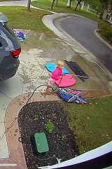 Daughter Gets Dad With Water Hose