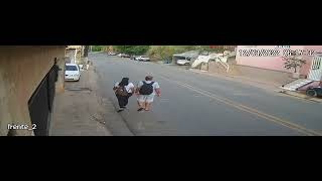 Pedestrians Narrowly Escape Being Hit by Car