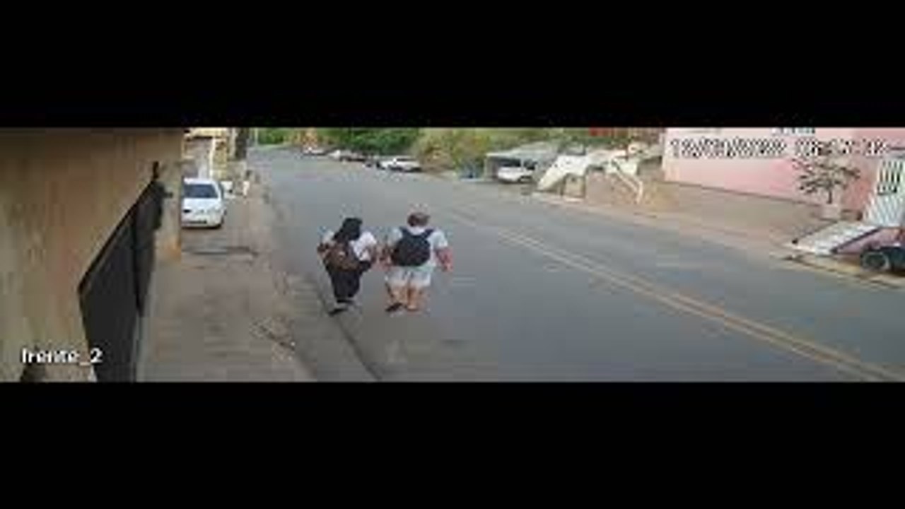 Pedestrians Narrowly Escape Being Hit by Car