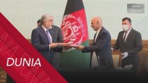 Ashraf Ghani - Abdullah Abdullah setuju kongsi kuasa