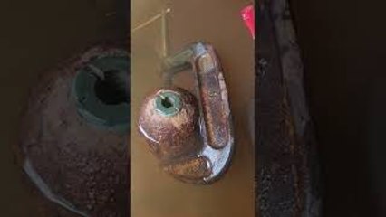 Cleaning an Old Artillery Shell