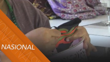 Pelitup muka boleh guna semula jana rezeki buat tukang jahit