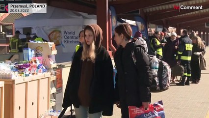 Ukrainian refugees board buses and trains to European destinations