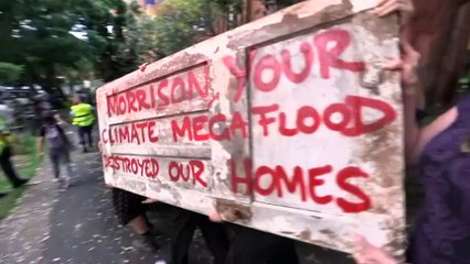Lismore residents protest near Kirribilli House in Sydney