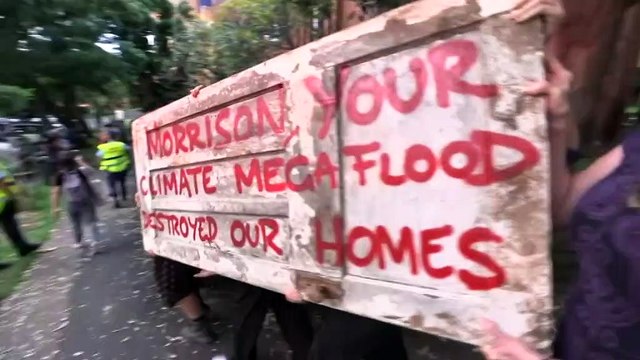 Lismore residents protest near Kirribilli House in Sydney