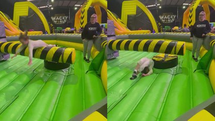 'Little girl BENT IN HALF after getting struck by spinning bar on bouncy house '