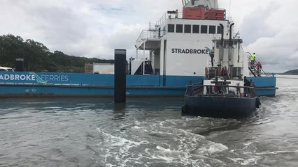 Barge refloated at Russell Island
