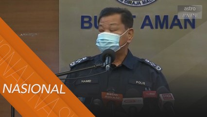 Mendiang terbaring dalam keadaan terlentang dengan pistol di bahu..